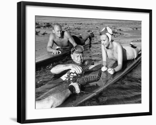 Diver Bringing Up Lobster for Beach Party-Peter Stackpole-Framed Premium Photographic Print