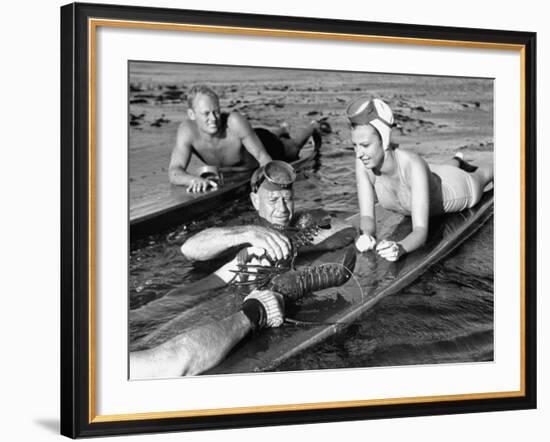 Diver Bringing Up Lobster for Beach Party-Peter Stackpole-Framed Premium Photographic Print