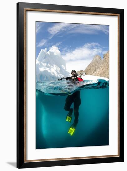 Diver in Front of an Iceberg, Astrolabe Island, Antarctic Peninsula, Antarctica-null-Framed Photographic Print