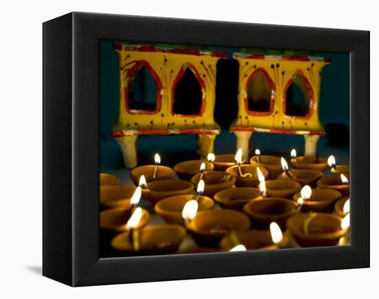 Diwali Deepak Lights (Oil and Cotton Wick Candles) and Shrine Decorations, India, Asia-Annie Owen-Framed Premier Image Canvas