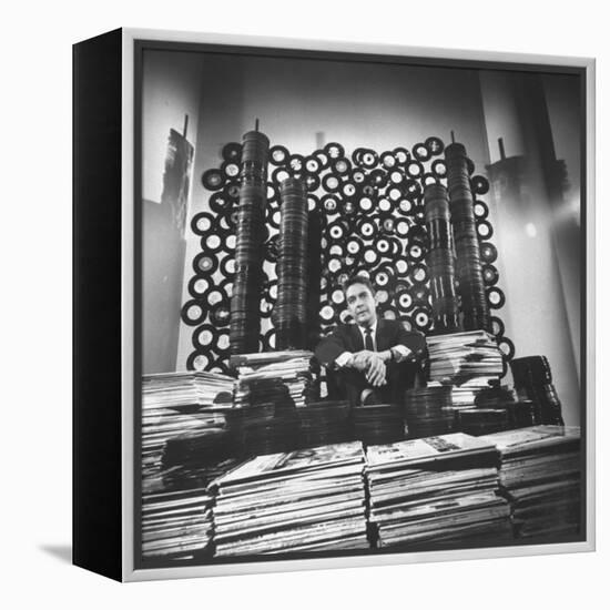 DJ William B. Williams Sitting Amid the 8,000 Records a DJ Receives Each Year from Record Companies-Joe Scherschel-Framed Premier Image Canvas