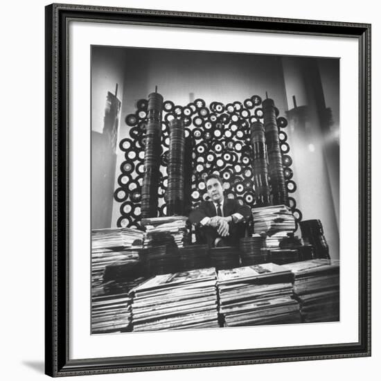 DJ William B. Williams Sitting Amid the 8,000 Records a DJ Receives Each Year from Record Companies-Joe Scherschel-Framed Premium Photographic Print