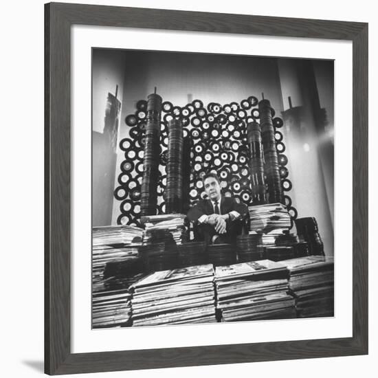 DJ William B. Williams Sitting Amid the 8,000 Records a DJ Receives Each Year from Record Companies-Joe Scherschel-Framed Premium Photographic Print