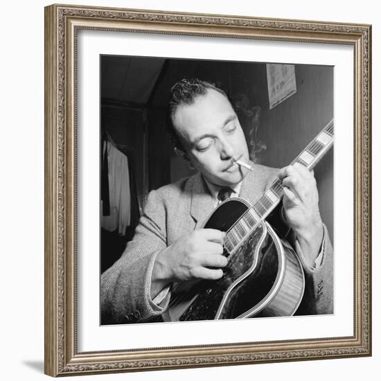 Django Reinhardt at the Aquarium in New York City, 1946-William Paul Gottlieb-Framed Photographic Print