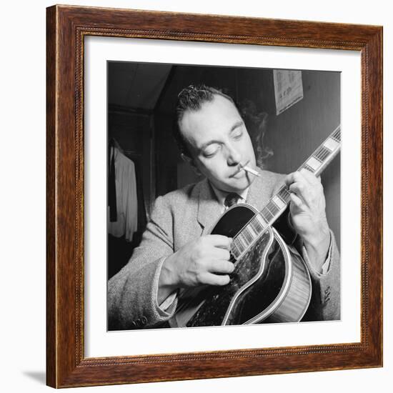 Django Reinhardt at the Aquarium in New York City, 1946-William Paul Gottlieb-Framed Photographic Print