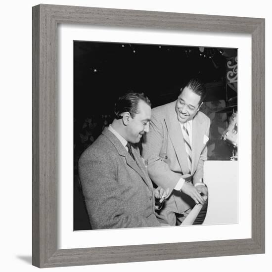 Django Reinhardt at the Aquarium in New York City, 1946-William Paul Gottlieb-Framed Photographic Print