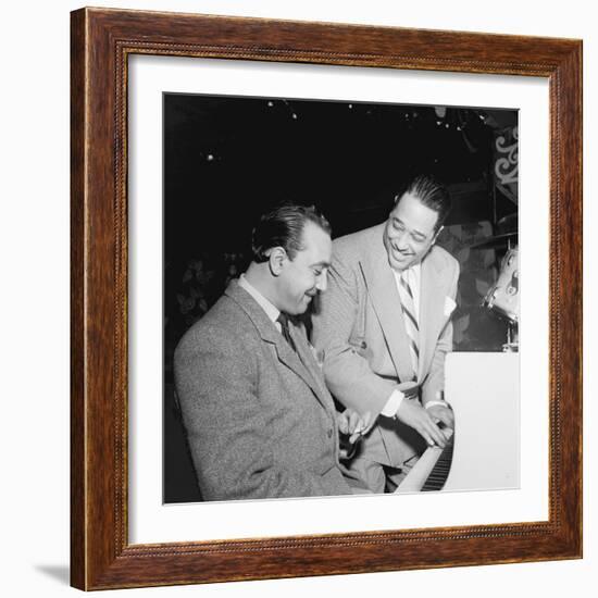 Django Reinhardt at the Aquarium in New York City, 1946-William Paul Gottlieb-Framed Photographic Print