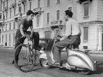 Two Men Talking in Street with Vespa Scooter and Bicycle-Dmitri Kessel-Photographic Print