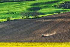 Farm Tractor Handles Earth on Field - Preparing Farmland for Sowing, Agricultural Landscape-Dmytro Balkhovitin-Photographic Print