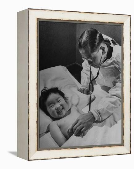 Doctor Examining Giggling Patient Recovering from Cold-Hansel Mieth-Framed Premier Image Canvas