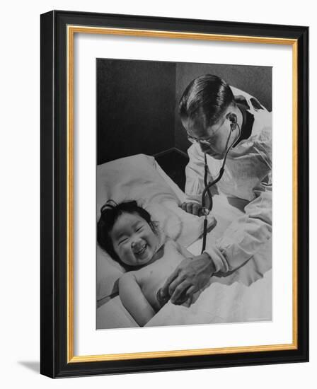 Doctor Examining Giggling Patient Recovering from Cold-Hansel Mieth-Framed Photographic Print