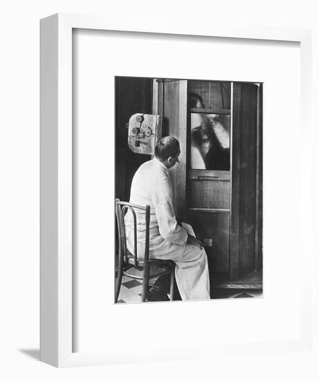 Doctor Using a Fluoroscope-null-Framed Photographic Print