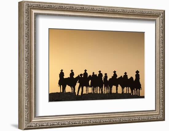 Dodge City Sign with Cowboy Silhouettes, Kansas, USA-Walter Bibikow-Framed Photographic Print