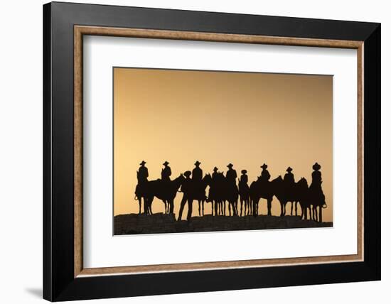 Dodge City Sign with Cowboy Silhouettes, Kansas, USA-Walter Bibikow-Framed Photographic Print