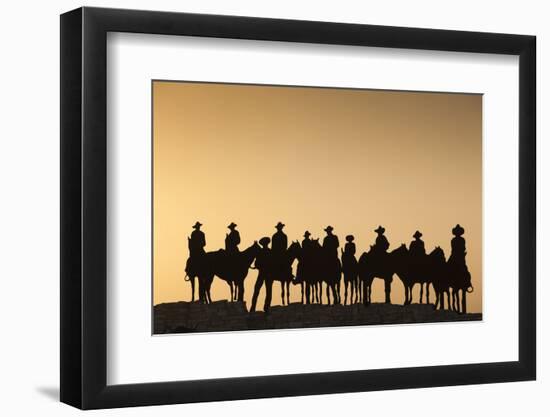 Dodge City Sign with Cowboy Silhouettes, Kansas, USA-Walter Bibikow-Framed Photographic Print