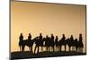 Dodge City Sign with Cowboy Silhouettes, Kansas, USA-Walter Bibikow-Mounted Photographic Print