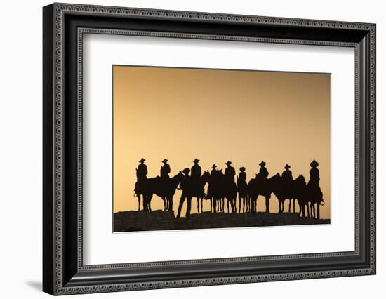 Dodge City Sign with Cowboy Silhouettes, Kansas, USA-Walter Bibikow-Framed Photographic Print