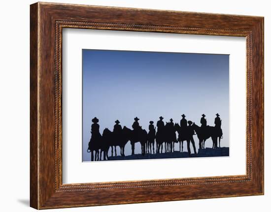 Dodge City Sign with Cowboy Silhouettes, Kansas, USA-Walter Bibikow-Framed Photographic Print