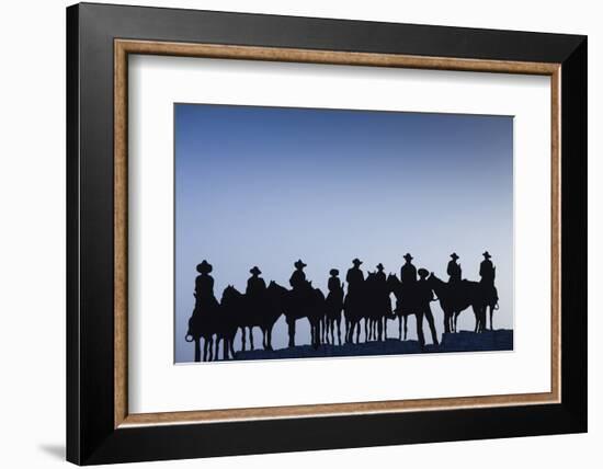 Dodge City Sign with Cowboy Silhouettes, Kansas, USA-Walter Bibikow-Framed Photographic Print