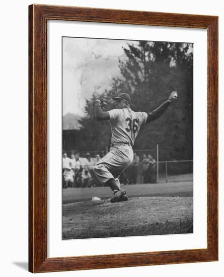 Dodger Don Newcombe Ready to Throw Ball During Game with Braves-null-Framed Premium Photographic Print