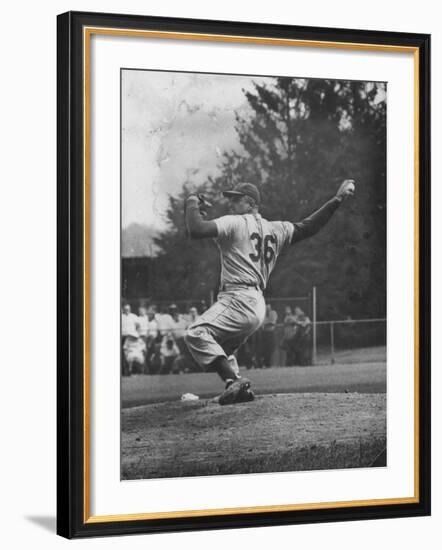Dodger Don Newcombe Ready to Throw Ball During Game with Braves-null-Framed Premium Photographic Print