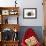 Dog and Lamb, Border Collie Sitting Between Two Cross-null-Framed Photographic Print displayed on a wall