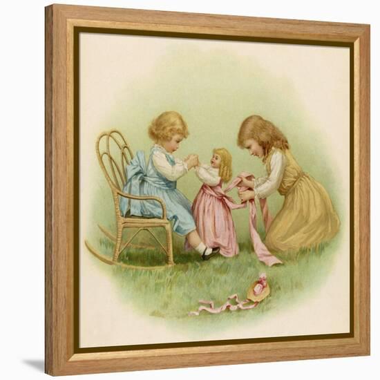 Doll is Dressed by Two Girls One in Front of Her While the Other Ties Her Sash Behind-Ida Waugh-Framed Premier Image Canvas