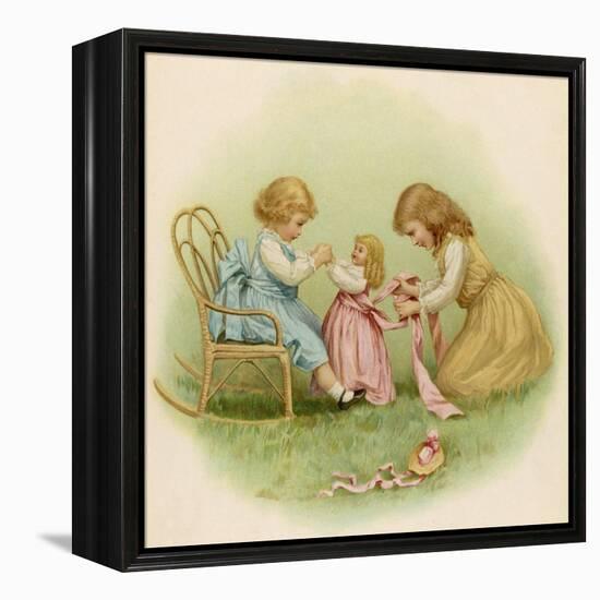 Doll is Dressed by Two Girls One in Front of Her While the Other Ties Her Sash Behind-Ida Waugh-Framed Premier Image Canvas