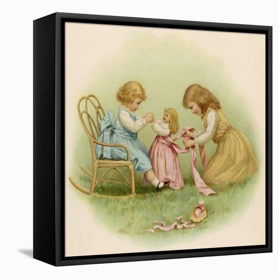 Doll is Dressed by Two Girls One in Front of Her While the Other Ties Her Sash Behind-Ida Waugh-Framed Premier Image Canvas