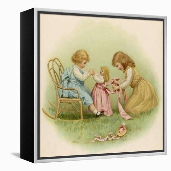 Doll is Dressed by Two Girls One in Front of Her While the Other Ties Her Sash Behind-Ida Waugh-Framed Premier Image Canvas