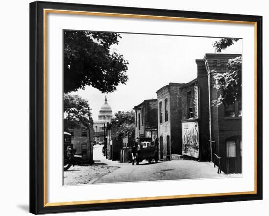 Dome of the Capitol Building Seen from Street in Neighboring Slum-Carl Mydans-Framed Photographic Print