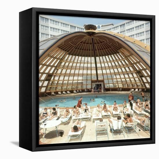 Dome over Swimming Pool as Guests are Served Cocktails at International Inn, Washington DC, 1963-Yale Joel-Framed Premier Image Canvas