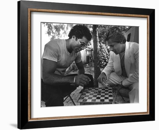 Don Johnson and Philip Michael Thomas of the Television Show 'Miami Vice', 1984-null-Framed Photographic Print