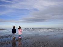 Boy Aged Four and Girl Aged Three on a Black Volcanic Sand Beach in Manawatu, New Zealand-Don Smith-Photographic Print
