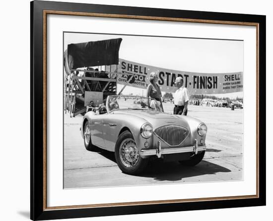 Donald Healey with an Austin Healey at a Motor Race-null-Framed Photographic Print