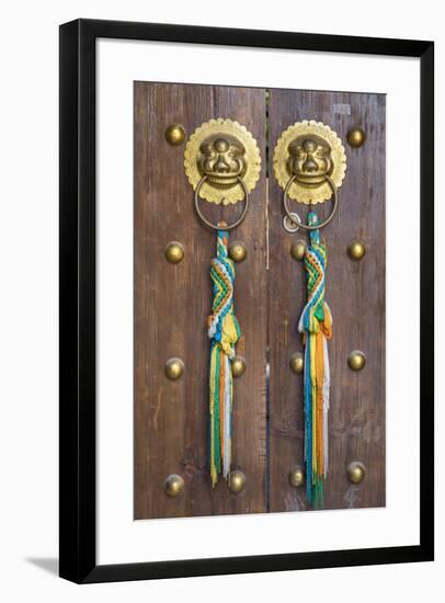 Door of guesthouse, Lijiang (UNESCO World Heritage Site), Yunnan, China-Ian Trower-Framed Photographic Print