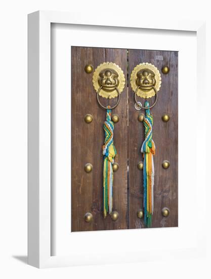 Door of guesthouse, Lijiang (UNESCO World Heritage Site), Yunnan, China-Ian Trower-Framed Photographic Print