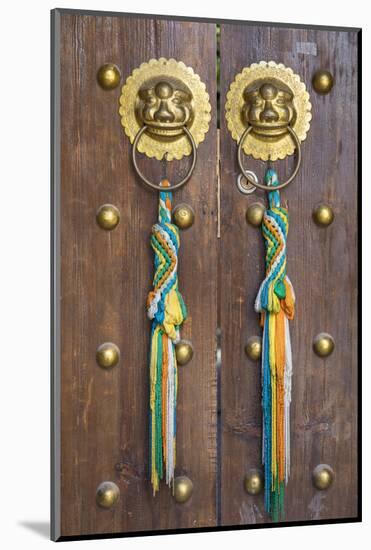 Door of guesthouse, Lijiang (UNESCO World Heritage Site), Yunnan, China-Ian Trower-Mounted Photographic Print