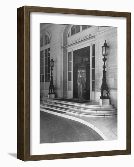 Doorman at the Entrance to Exelsior Hotel-Dmitri Kessel-Framed Photographic Print