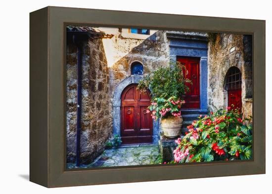 Doors And Flowers in Civita Di Bagnoregio-George Oze-Framed Premier Image Canvas