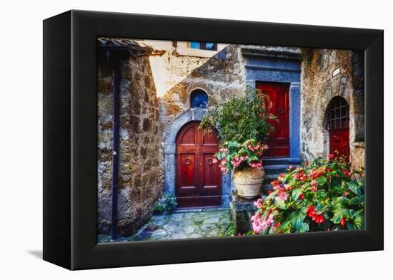 Doors And Flowers in Civita Di Bagnoregio-George Oze-Framed Premier Image Canvas