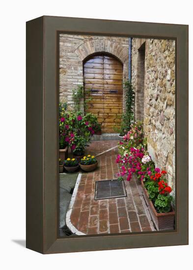 Doorway with Flowers, Pienza, Tuscany, Italy-Terry Eggers-Framed Premier Image Canvas