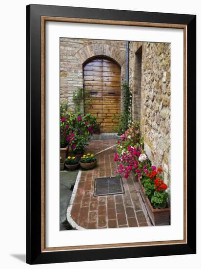 Doorway with Flowers, Pienza, Tuscany, Italy-Terry Eggers-Framed Premium Photographic Print
