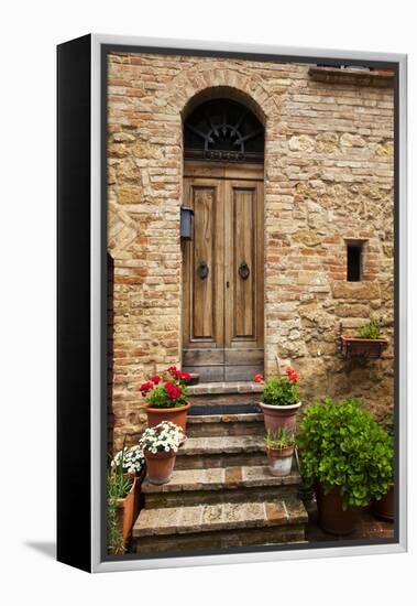 Doorway with Flowers, Pienza, Tuscany, Italy-Terry Eggers-Framed Premier Image Canvas