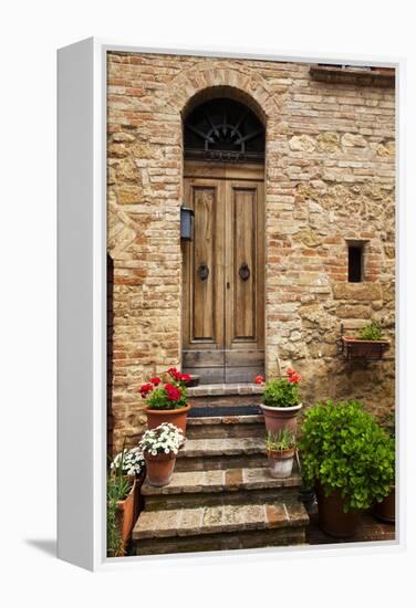 Doorway with Flowers, Pienza, Tuscany, Italy-Terry Eggers-Framed Premier Image Canvas