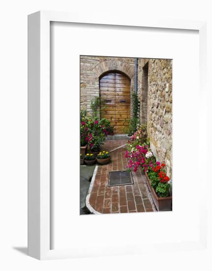 Doorway with Flowers, Pienza, Tuscany, Italy-Terry Eggers-Framed Premium Photographic Print