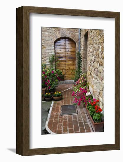 Doorway with Flowers, Pienza, Tuscany, Italy-Terry Eggers-Framed Photographic Print