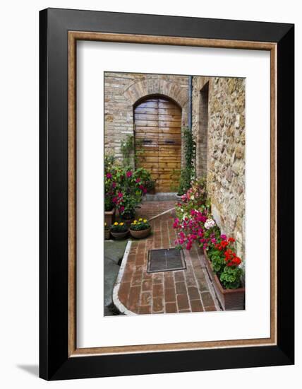 Doorway with Flowers, Pienza, Tuscany, Italy-Terry Eggers-Framed Photographic Print