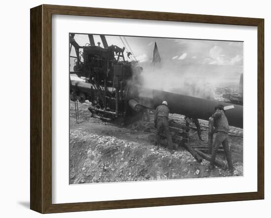 "Dope and Wrap" Being Applied to a Pipe after it Was Welded and Cleaned-null-Framed Premium Photographic Print