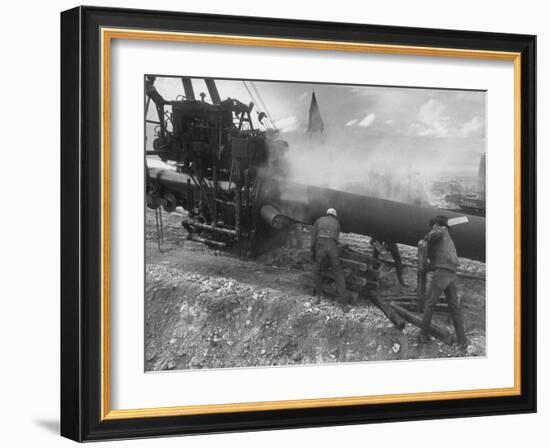 "Dope and Wrap" Being Applied to a Pipe after it Was Welded and Cleaned-null-Framed Photographic Print